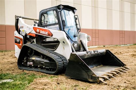 building roads skid steer|Building a road with a Bobcat .